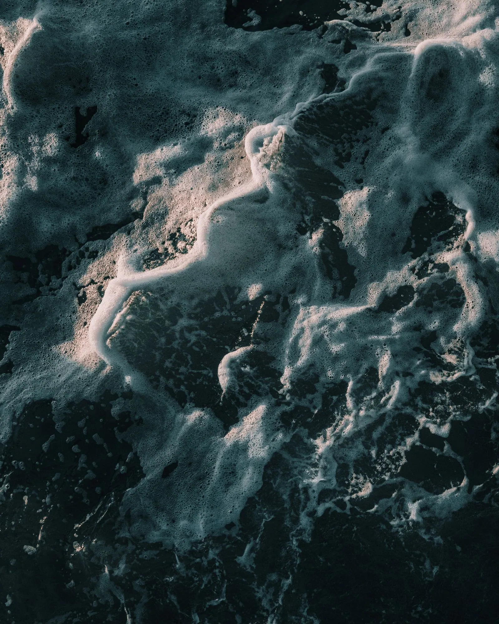 Dark ocean water seen from above