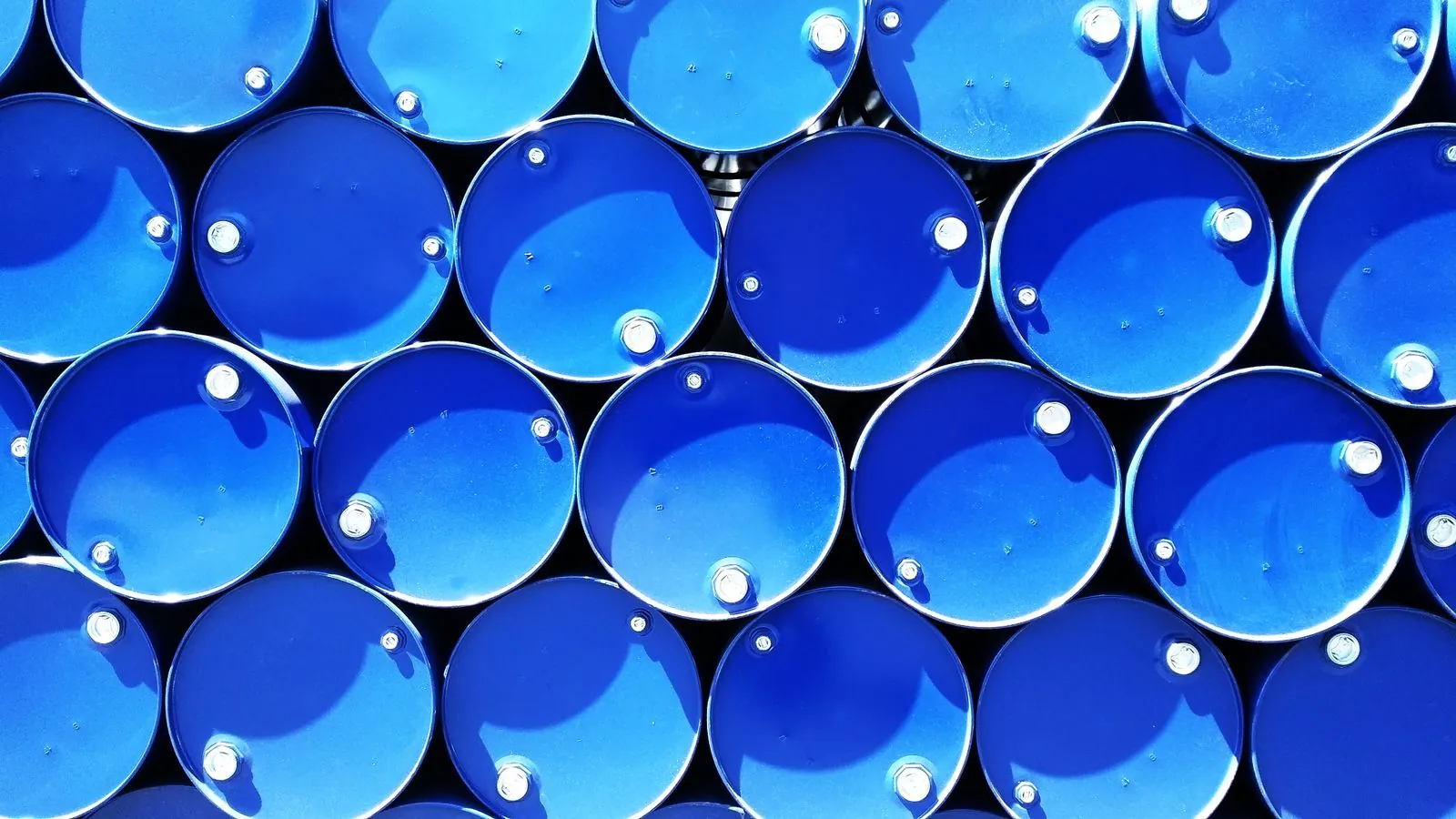 Rows of sealed steel drums photographed from above