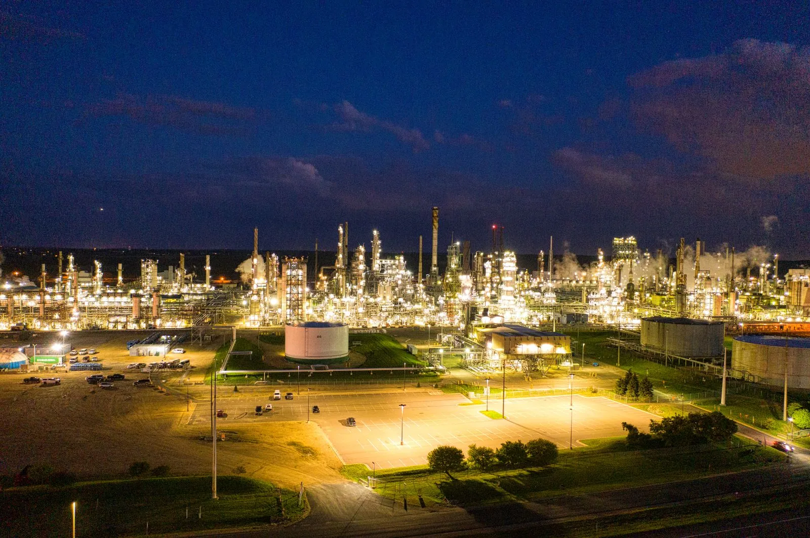 Refinery and terminal complex glowing at dusk
