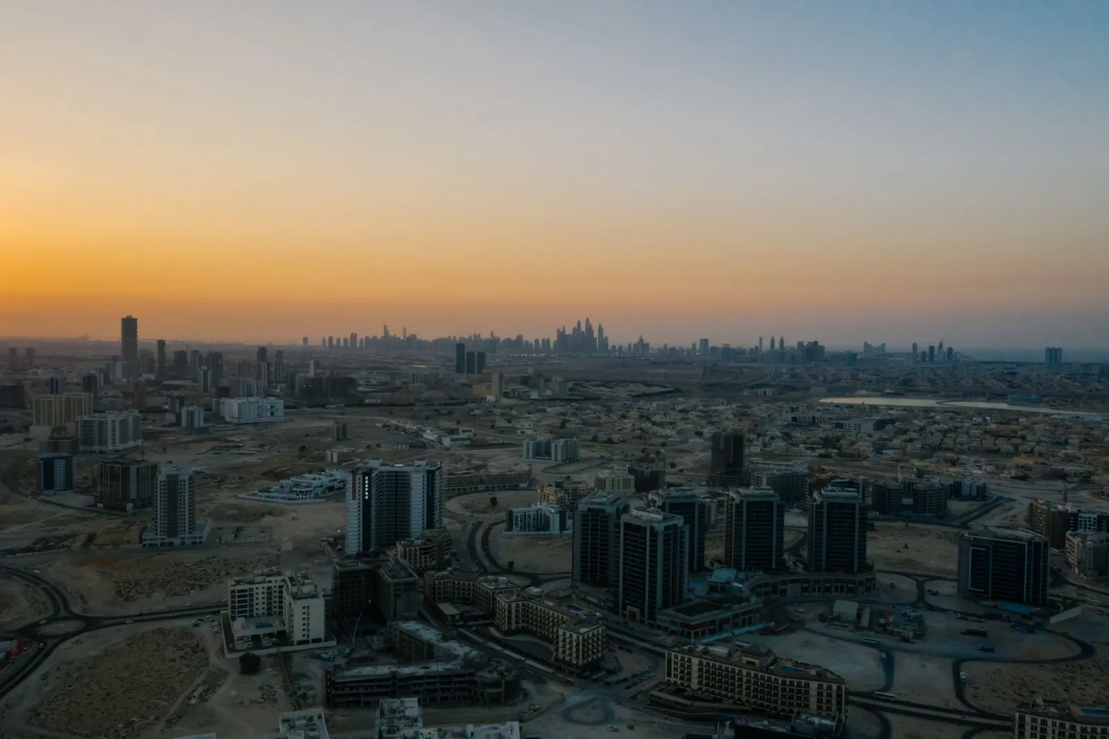 Emirati cityscape at dusk seen from the air